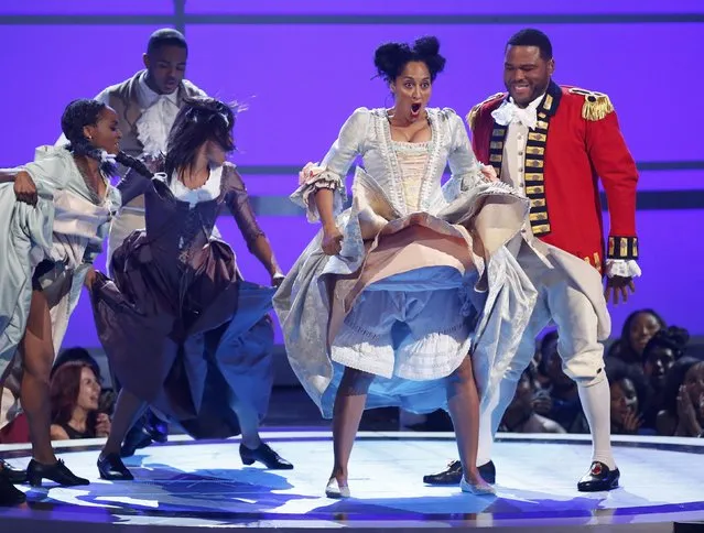 Show hosts Tracee Ellis Ross (L) and Anthony Anderson perform a skit based on the Tony Award-winning play “Hamilton” at the 2016 BET Awards in Los Angeles, California, U.S., June 26, 2016. (Photo by Danny Moloshok/Reuters)