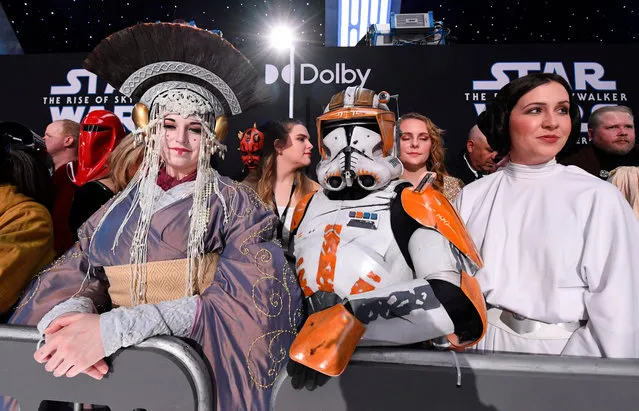 Fans in Star Wars costumes attend the world premiere of Disney's “Star Wars: Rise of Skywalker” at the TCL Chinese Theatre in Hollywood, California on December 16, 2019. (Photo by Valerie Macon/AFP Photo)