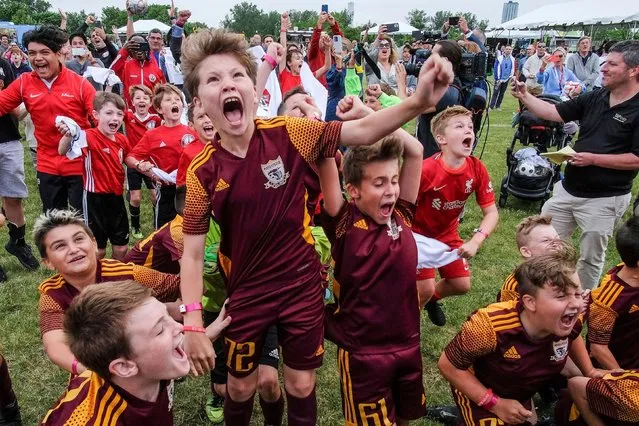 Children and people react as they attend the 2026 FIFA World Cup Host City Selection Watch Party at the Liberty State Park in Jersey City, New Jersey, U.S., June 16, 2022. (Photo by Eduardo Munoz/Reuters)