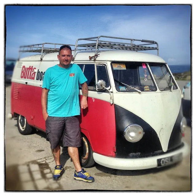 Grant Goree, 39, from Woking poses for a photograph besides his 1958 first generation or T1, split-screen Volkswagen Transporter van in Newquay on August 6, 2014 in Cornwall, England. The van, which he bought for £6000 twelve years ago is an ex-German airport fire truck and is nicknamed Tulula. (Photo by Matt Cardy/Getty Images)