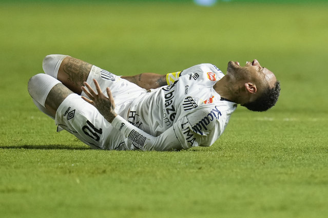 Brazil's Neymar grimaces in pain after he was fouled during his debut for Santos FC in a Sao Paulo league soccer match, against Botafogo-SP in Santos, Brazil, Wednesday, February 5, 2025. (Photo by Andre Penner/AP Photo)