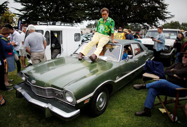 William Hughes sits on his 1973 “Vomit Comet” during the Concours d'LeMons in Seaside, California, U.S. August 20, 2016. (Photo by Michael Fiala/Reuters/Courtesy of The Revs Institute)