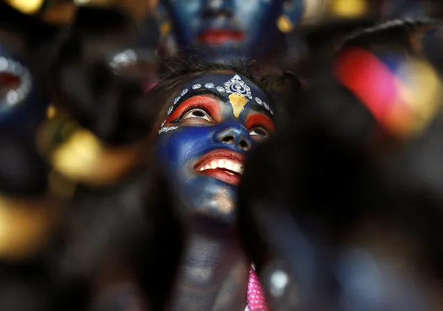 Students participate in celebrations ahead of the Janmashtami festival, which marks the birth anniversary of Lord Krishna in Mumbai, India, August 23, 2016. (Photo by Danish Siddiqui/Reuters)