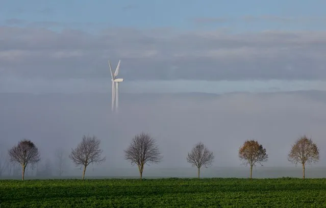 A power-generating windmill turbine is seen near Wavre, Belgium on November 29, 2022. (Photo by Yves Herman/Reuters)