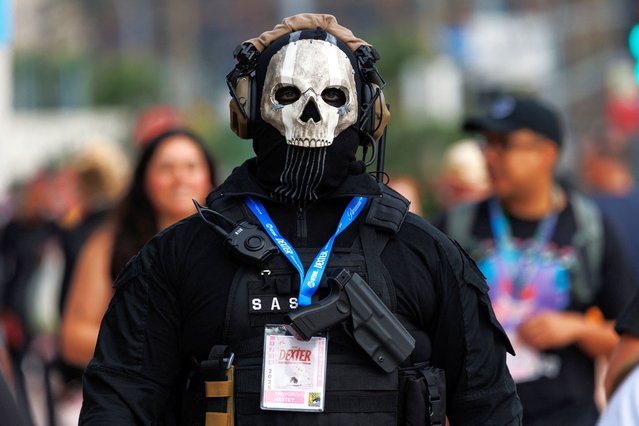 An attendee arrives in costume for the opening day of Comic-Con International in San Diego, California, U.S. July 24, 2025. (Photo by Mike Blake/Reuters)