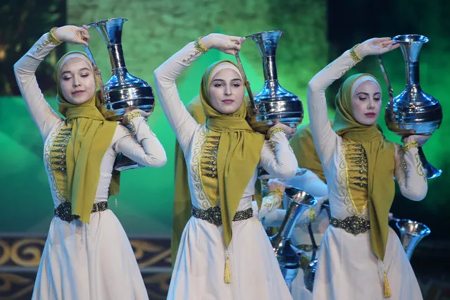 Members of the Vainakh dance ensemble perform at the closing of the 2020 Caucasian peoples' festival of sports and culture in Grozny, Chechnya on October 25, 2020. (Photo by Yelena Afonina/TASS)