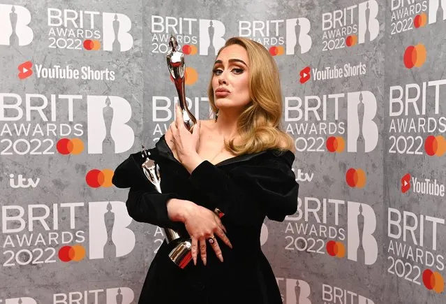 English singer-songwriter Adele poses with her award in the media room during The BRIT Awards 2022 at The O2 Arena on February 08, 2022 in London, England. (Photo by Kate Green/Getty Images )