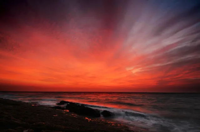 Sunrise at Ebb’s Nook in Northumberland, Beadnell, England on October 4, 2015. (Photo by Neil Squires/PA Wire)