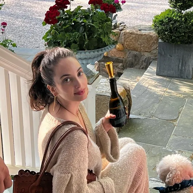 American singer-songwriter Alexa Ray Joel in the second decade of May 2023 gets ready to pop some Prosecco. (Photo by christiebrinkley/Instagram)