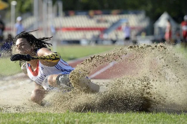France's Arnaud Assoumani competes the Men's Long Jump T46 final of the IPC Athletics World Championships at the Rhone Stadium in Venissieux, near Lyon, on July 21, 2013. (Photo by Philippe Desmazes/AFP Photo)