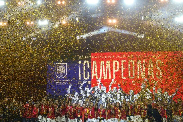 Members of the Spain's Women's World Cup soccer team celebrate on stage their Women's World Cup victory in Madrid, Spain, Monday, August 21, 2023. Spain beat England in Sydney on Sunday to win the Women's World Cup soccer final. (Photo by Manu Fernandez/AP Photo)