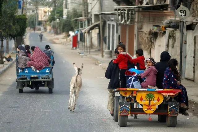 A donkey runs as Palestinians flee their homes during Israeli air and artillery strikes while cross-border violence between the Israeli military and Palestinian militants continues, in the northern Gaza Strip on May 14, 2021. (Photo by Mohammed Salem/Reuters)