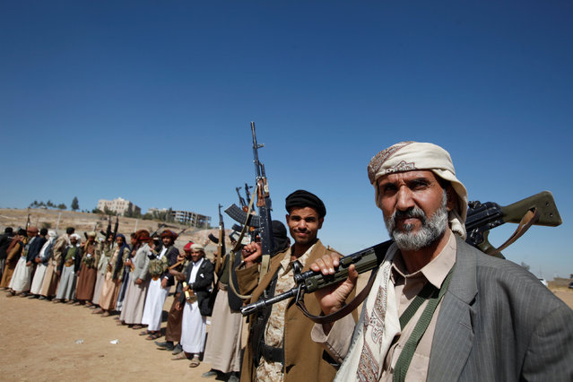 Tribesmen attend a gathering held to show support to the new government formed by Yemen's armed Houthi movement and its political allies, in Sanaa, Yemen December 6, 2016. (Photo by Khaled Abdullah/Reuters)