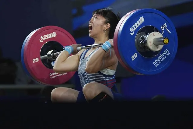 Taiwan's Guan Ling Chen competes in the women's 55kg Group A weightlifting final at 19th Asian Games in Hangzhou, China, Saturday, September 30, 2023. (Photo by Aijaz Rahi/AP Photo)