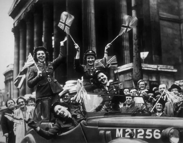 Soldiers from the Women's Royal Army Corps in their service vehicle, driving through Trafalgar Square during the VE Day celebrations in London. (Photo by R.J. Salmon/Getty Images)