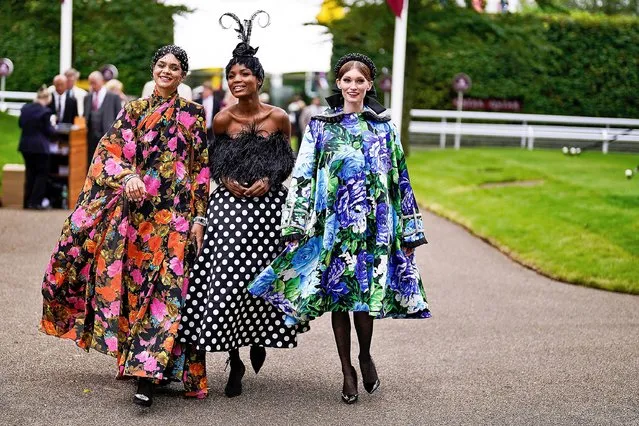 Fashion arrives during the Qatar Goodwood Festival at Goodwood Racecourse on July 27, 2021 in Chichester, England. (Photo by Alan Crowhurst/Getty Images)