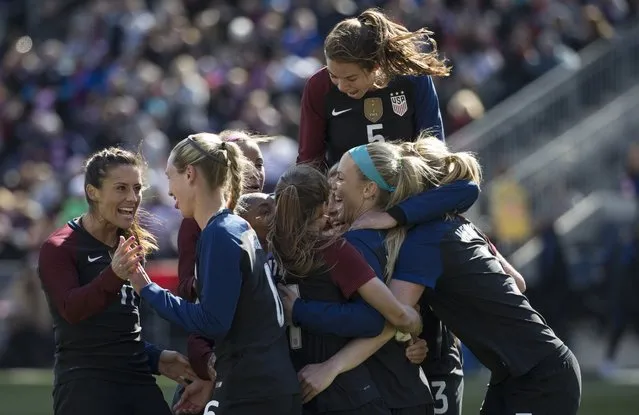 United States' Julie Johnston, center right, celebrates her second goal with teammates during the second half of an international friendly soccer match against Colombia, Sunday, April 10, 2016, in Chester, Pa. The United States won 3-0. (Photo by Chris Szagola/AP Photo)
