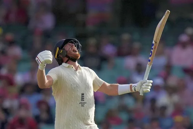 England's Jonny Bairstow celebrates on making a century against Australia during the third day of the fourth Ashes cricket test match in Sydney, Friday, January 7, 2022. (Photo by Rick Rycroft/AP Photo)