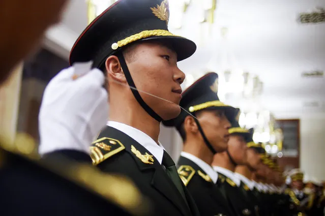 Chinese honour guards prepare for the arrival of China's Premier Li Keqiang and Israel's Prime Minister Benjamin Netanyahu for a welcome ceremony at the Great Hall of the People in Beijing on March 20, 2017. Netanyahu is on a state visit to China from March 19 to 22. (Photo by Wang Zhao/AFP Photo)