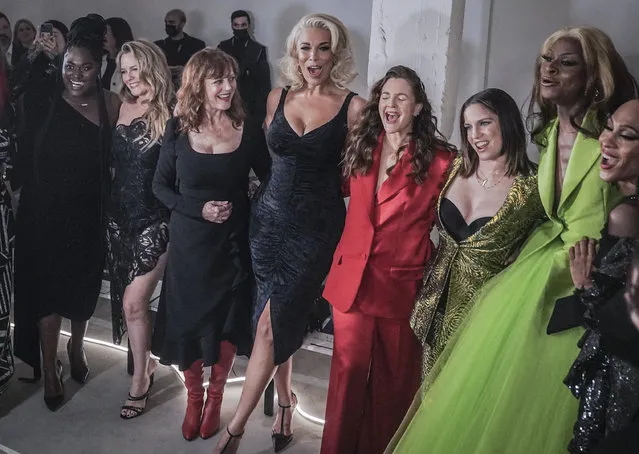 Celebrities from left to right, Danielle Brooks, Alicia Silverstone, Susan Sarandon, Hannah Waddingham, Drew Barrymore, Anna Chlumsky, Symone, and M.J. Rodriguez pose for photos before viewing Christian Siriano's fall/winter 2022 fashion collection during Fashion Week, Saturday February 12, 2022, in New York. (Photo by Bebeto Matthews/AP Photo)