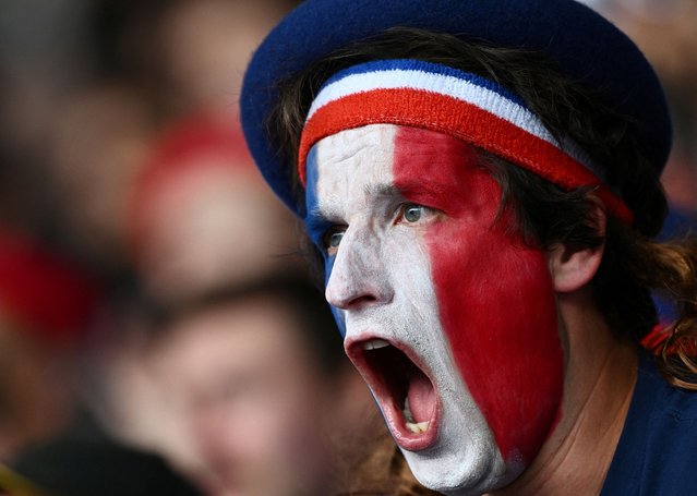 A France fan pictured with his face painted reacts in the stands during Rugby Sevens, Men's Pool C, France vs United States of America at Stade de France in Saint-Denis on July 24, 2024. (Photo by Dylan Martinez/Reuters)