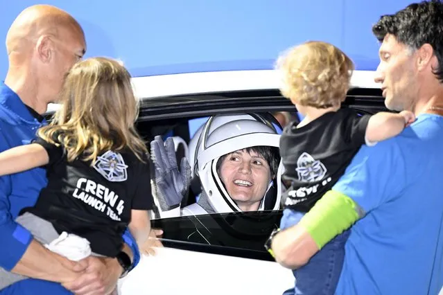 ESA astronaut Samantha Cristoforetti, waves to family members after walking out of the Neil Armstrong O&C Building at the the Kennedy Space Center, Florida on Wednesday, April 27, 2022. (Photo by Joe Marino/UPI/Alamy Live News)