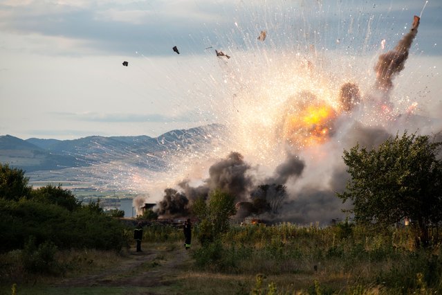 An explosion and fire are occurring in firework warehouses near the village of Elin Pelin Station, 30 kilometers from Sofia, Bulgaria, on July 25, 2024. Two people are injured and are in critical condition. The authorities are declaring a partial state of emergency in the town of Elin Pelin, as well as in the villages of Gara Elin Pelin and Novi Khan. (Photo by Hristo Vladev/NurPhoto/Rex Features/Shutterstock)