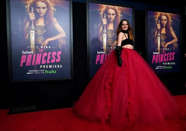 Joey King, star of “The Princess”, turns back at the premiere of the Hulu film, Thursday, June 16, 2022, at the Hollywood Legion Theater in Los Angeles. (Photo by Chris Pizzello/AP Photo)