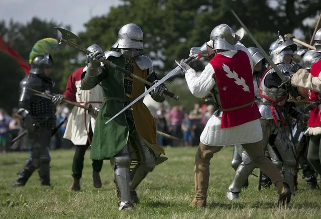 Historical re-enactors re-create the Battle of Tewkesbury as part of an anniversary event for the Battle of Bosworth near Market Bosworth in central Britain August 22, 2015. (Photo by Neil Hall/Reuters)