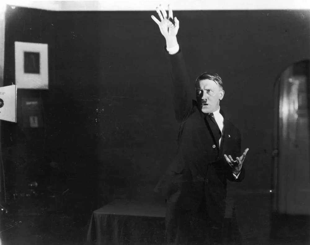 Adolf Hitler Posing to a Recording of One of His Speeches [Oldies]