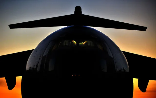A C-17 Globemaster III crew prepares an air refueling mission September 27, 2012, at Joint Base Charleston, S.C. (Photo by Airman 1st Class Matthew J. Bruch/U.S. Air Force photo)