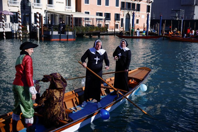 Revelers dressed as nuns participate in the Venice Carnival in Venice, Italy on January 28, 2024. (Photo by Guglielmo Mangiapane/Reuters)
