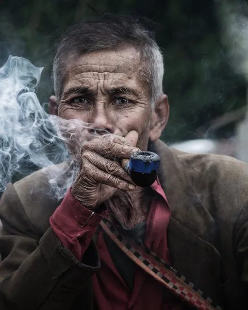 “Memories”. The person in this photograph i met beside a lonely road in Meghalaya, India. I spent one and a half hours with him,and we talked about so many things, and basically I was just a listener. Photo location: Meghalaya, India. (Photo and caption by Jayanta Roy/National Geographic Photo Contest)