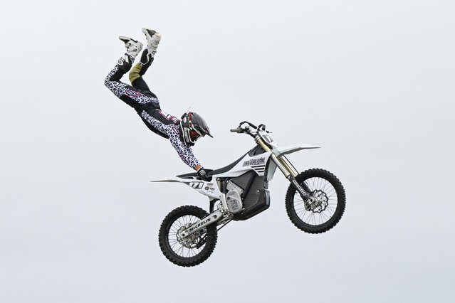 A rider from Bolddog FMX performs a daredevil stunt in the Underdown Ring at the Honiton Show in Devon, England on August 7, 2025. (Photo by Graham Hunt/Alamy Live News)