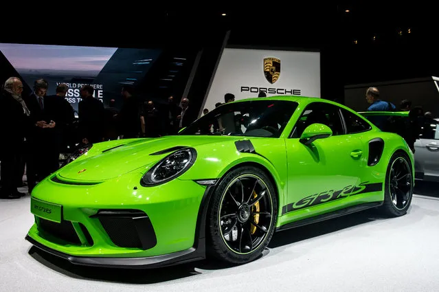 Porsche 911 GT3RS is displayed at the 88th Geneva International Motor Show on March 6, 2018 in Geneva, Switzerland. Global automakers are converging on the show as many seek to roll out viable, mass-production alternatives to the traditional combustion engine, especially in the form of electric cars. The Geneva auto show is also the premiere venue for luxury sports cars and imaginative prototypes. (Photo by Robert Hradil/Getty Images)