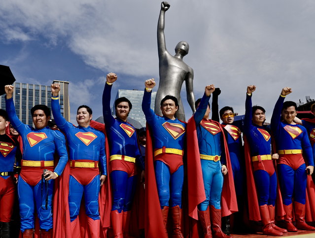 Filipino fans wearing Superman costumes gesture during the “Superman Look Up Fan Meet” in Manila, Philippines, 19 June 2025. The “Superman” movie world tour kicks off in the Philippines. The movie is scheduled for an international release on 09 July 2025. (Photo by Francis R. Malasig/EPA)
