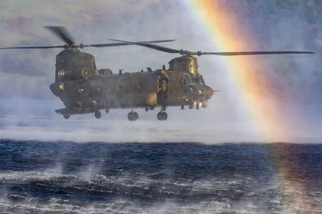 RAF Equipment, highly commended. An RAF Chinook performs a simulated water insertion over a lake. (Photo by Cpl Tim Laurence/2020 RAF Photo Competition)