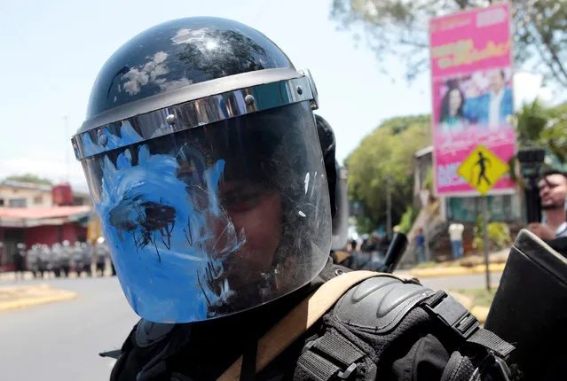 A riot policeman wears a helmet painted by a demonstrator during a protest in Managua, Nicaragua May 2, 2018. (Photo by Oswaldo Rivas/Reuters)