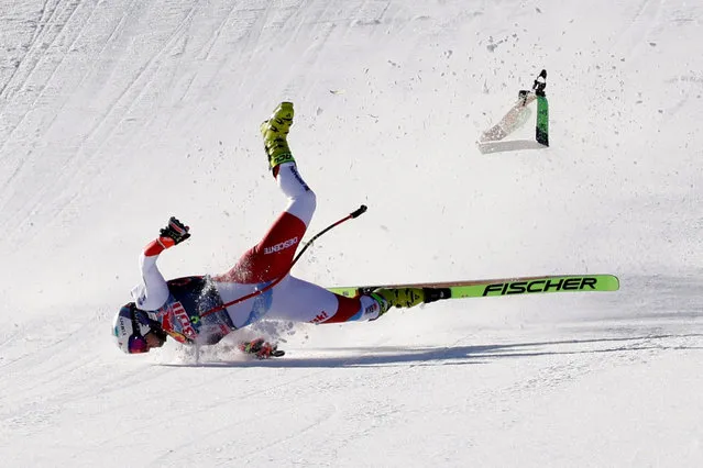 Switzerland's Urs Kryenbuehl crashes during his run during the men's downhill event at the FIS Alpine Ski World Cup, also known as Hahnenkamm race, in Kitzbuehel, Austria, on January 22, 2021. (Photo by Leonhard Foeger/Reuters)