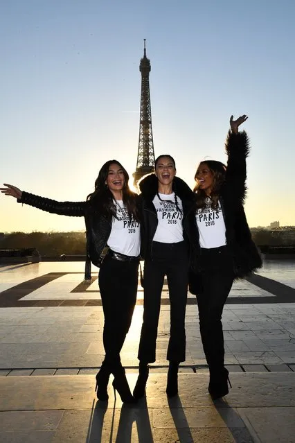 Lily Aldridge, Adriana Lima and Jasmine Tookes pose in front of the Eiffel Tower prior the 2016 Victoria's Secret Fashion Show on November 29, 2016 in Paris, France. (Photo by Dimitrios Kambouris/Getty Images for Victoria's Secret)