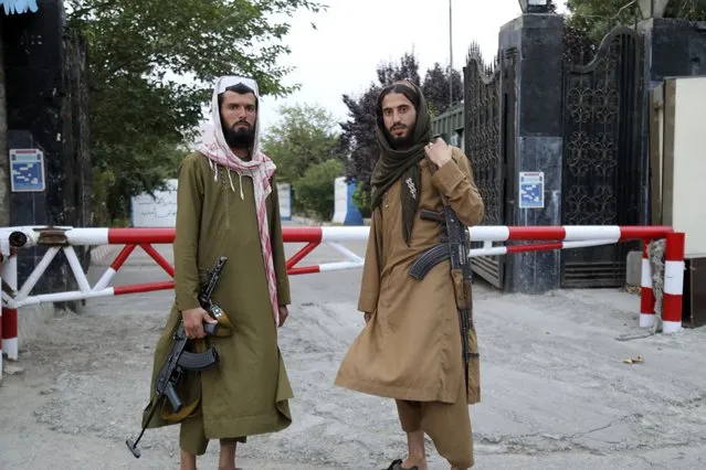 Taliban fighters pose for photograph in Kabul, Afghanistan, Tuesday, July 25, 2023. The Taliban announced Tuesday that all beauty salons in Afghanistan must now close as a one-month deadline ended, despite rare public opposition to the edict. (Photo by Siddiqullah Khan/AP Photo)