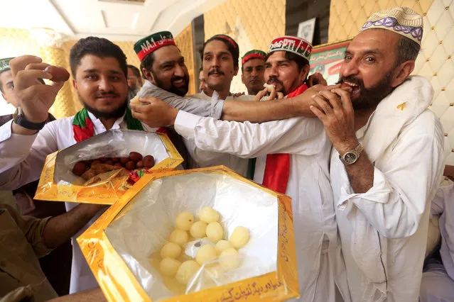 Supporters of Pakistan Tehreek-e-Insaf (PTI) celebrate a day after general elections in Peshawar, Pakistan, 26 July 2018. Millions of Pakistanis turned out for parliamentary elections on 25 July, despite the threat of violence by extremist militant groups. Voters had to choose from 11,000 candidates to elect 272 members of the Parliament for the next term. (Photo by Bilawal Arbab/EPA/EFE)