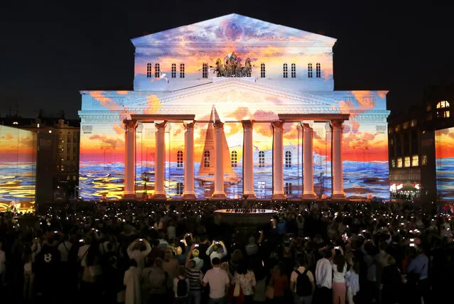 A view of the Bolshoi Theatre facade illuminated as part of the 2018 Circle of Light International Festival, an annual Moscow audiovisual art event in Moscow, Russia on September 21, 2018. (Photo by Stanislav Krasilnikov/TASS)