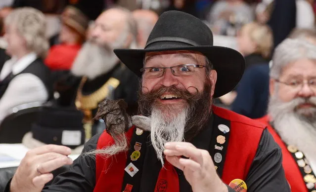 Participant Elmar Weisser competes in the category “Full Beard Freestyle”  during the World Beard Championships on November 2, 2013 in Leinfelden-Echterdingen, southern Germany. More than 200 competitors from over 20 countries take part in the event. (Photo by Franziska Kraufmann/AFP Photo/DPA)