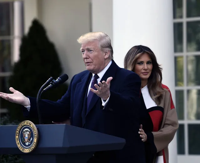 U.S. President Donald Trump arrives for the annual turkey pardoning ceremony at the White House in Washington, DC, on November 20, 2018 as U.S. First Lady Melania Trump(R) looks on. (Photo by Brendan Smialowski/AFP Photo)