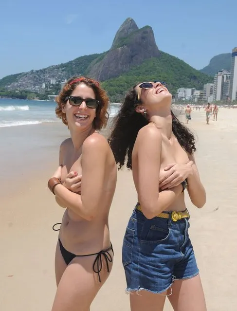 More than 2000 women have pledged on Facebook to join a topless event on Rio's famed Ipanema beach to mark the arrival of summer later this month. The “Toplessaco”, scheduled for December 21, is the brainchild of Ana Rios (L), a 23-year-old event planning expert and human rights activist, the daily O Dia newspaper reports. (Photo by José Pedro Monteiro/Agência O Dia/Estadão Conteúdo)