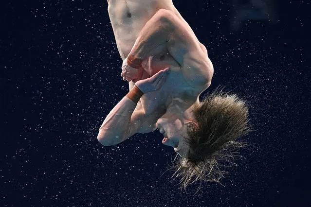 Australia's Cassiel Rousseau competes in the men's 10m platform diving final event during the Tokyo 2020 Olympic Games at the Tokyo Aquatics Centre in Tokyo on August 7, 2021. (Photo by Oli Scarff/AFP Photo)