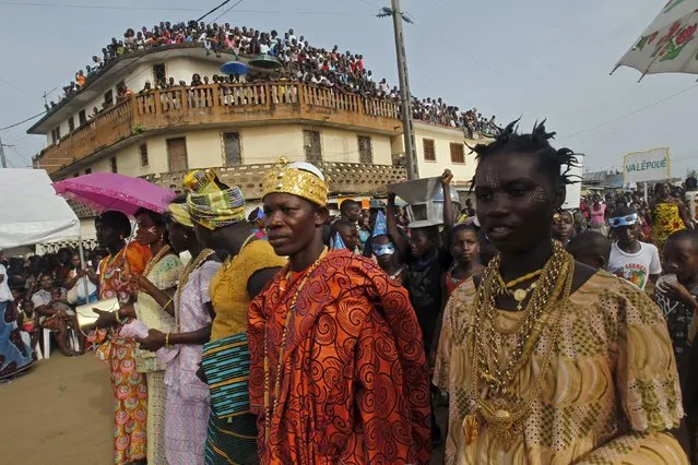 People take part in a parade during the Popo (Mask) Carnival of Bonoua, in the east of Abidjan, April 18, 2015. (Photo by Luc Gnago/Reuters)