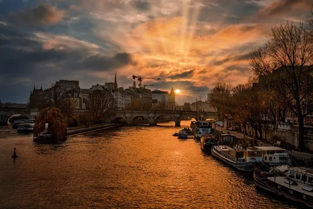 A view from Seine River in Paris, France on December 25, 2023. Paris, one of the most important centers of finance, diplomacy, trade, fashion, gastronomy, science and art in Europe, also attracts attention with its historical and cultural buildings. (Photo by Fatih Gonul/Anadolu via Getty Images)