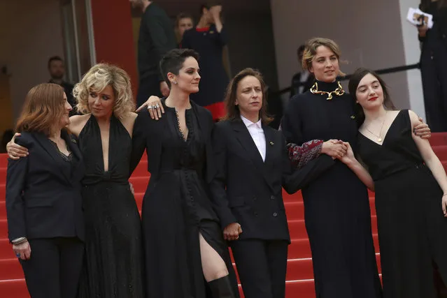 Actresses Benedicte Couvreur, from left, Valeria Golino, Noemie Merlant, director Celine Sciamma, actresses Adele Haenel, and Luana Bajrami pose for photographers upon arrival at the premiere of the film “Portrait of a Lady on Fire” at the 72nd international film festival, Cannes, southern France, Sunday, May 19, 2019. (Photo by Vianney Le Caer/Invision/AP Photo)